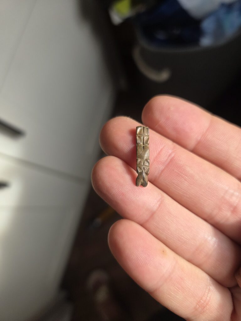Strap end